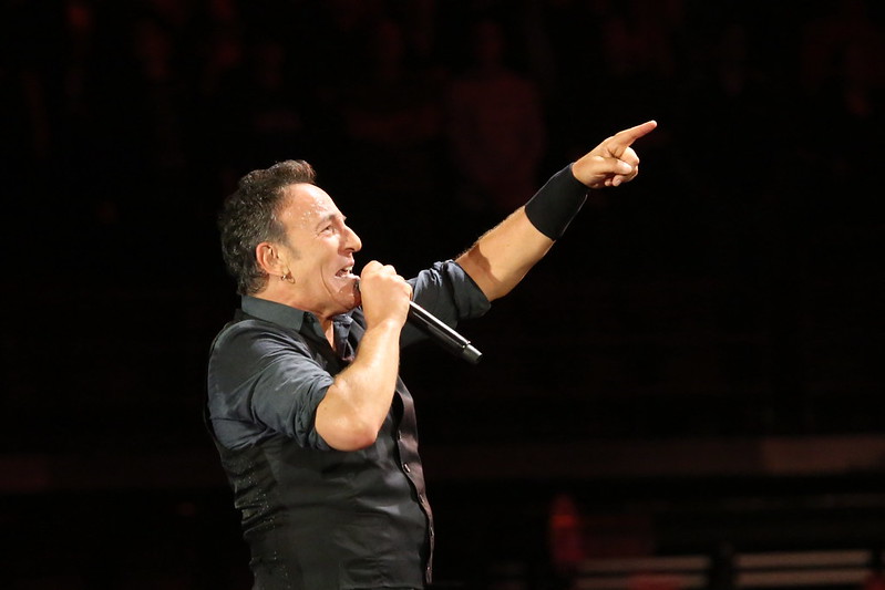 Musician Bruce Springsteen Singing at Concert