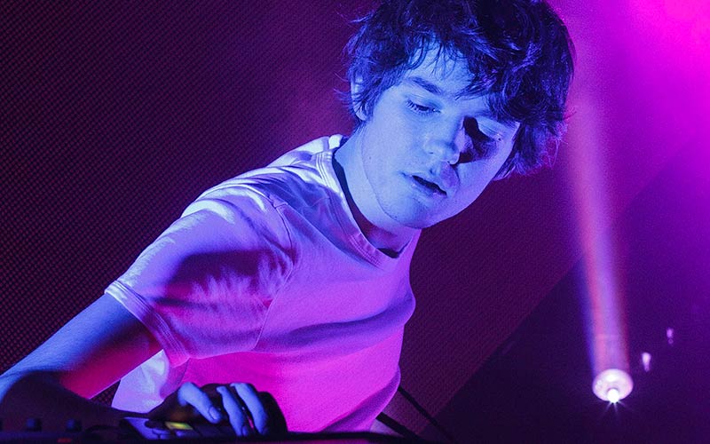 Madeon performing on stage