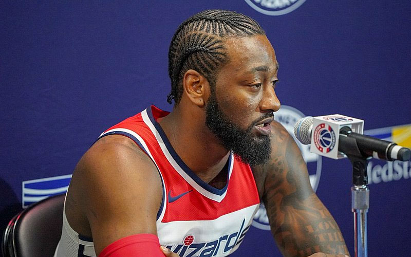 John Wall speaking at a press conference
