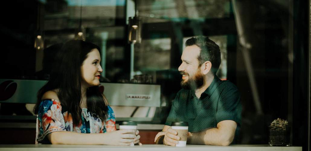 Man and woman having coffee